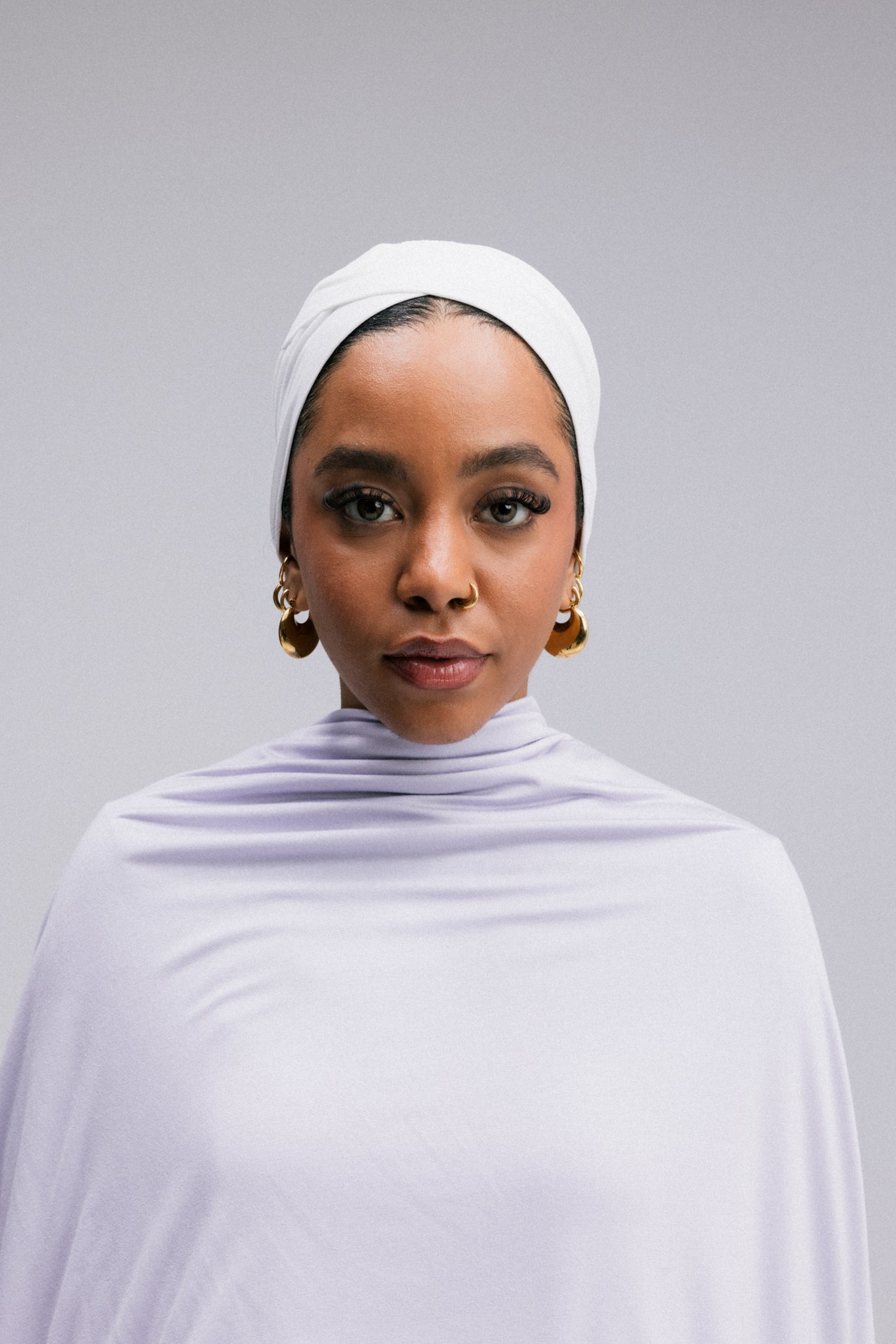 Overlay hijab undercaps, designed in a sleek V shape.