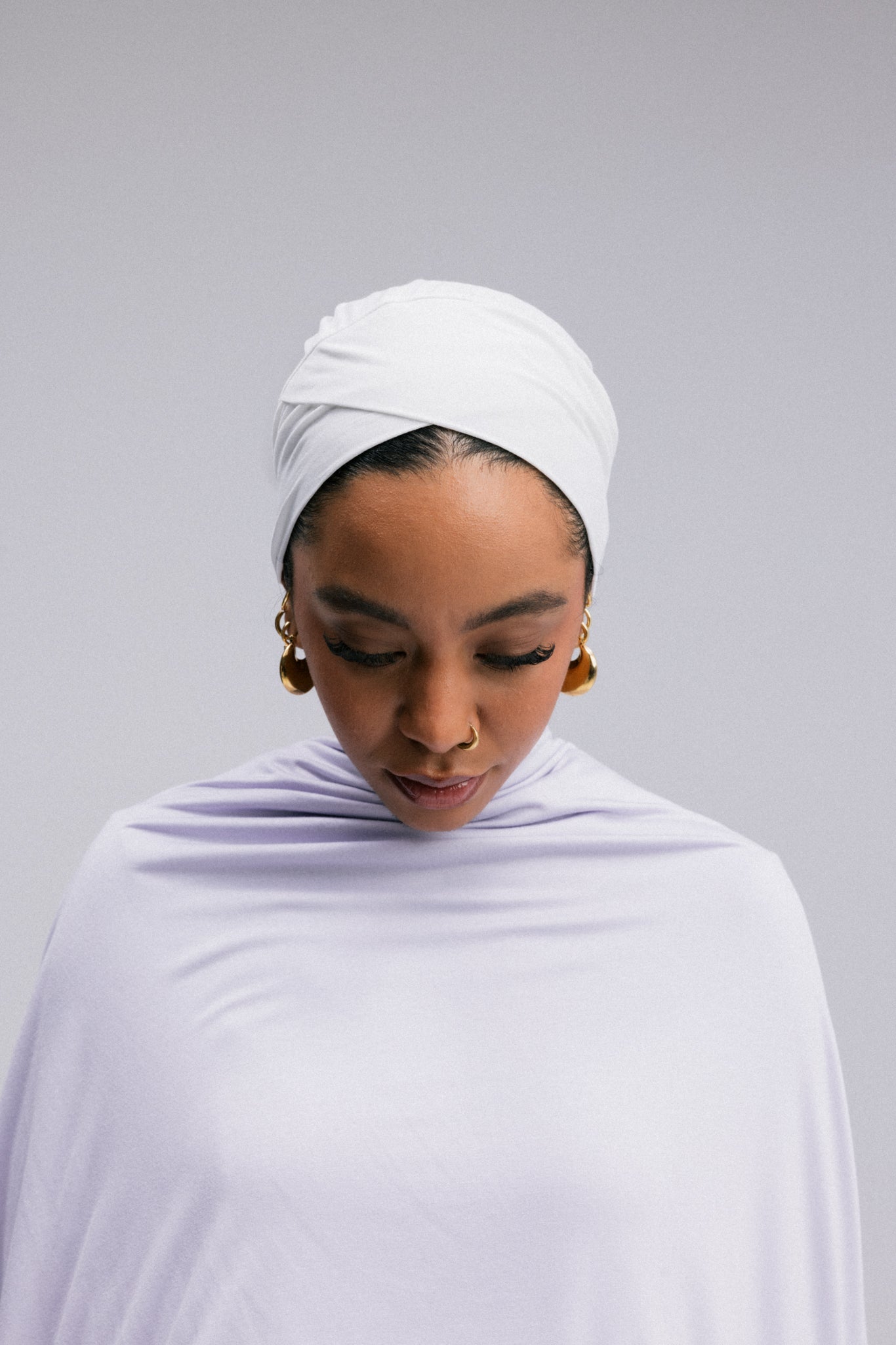 Overlay hijab undercaps, designed in a sleek V shape.