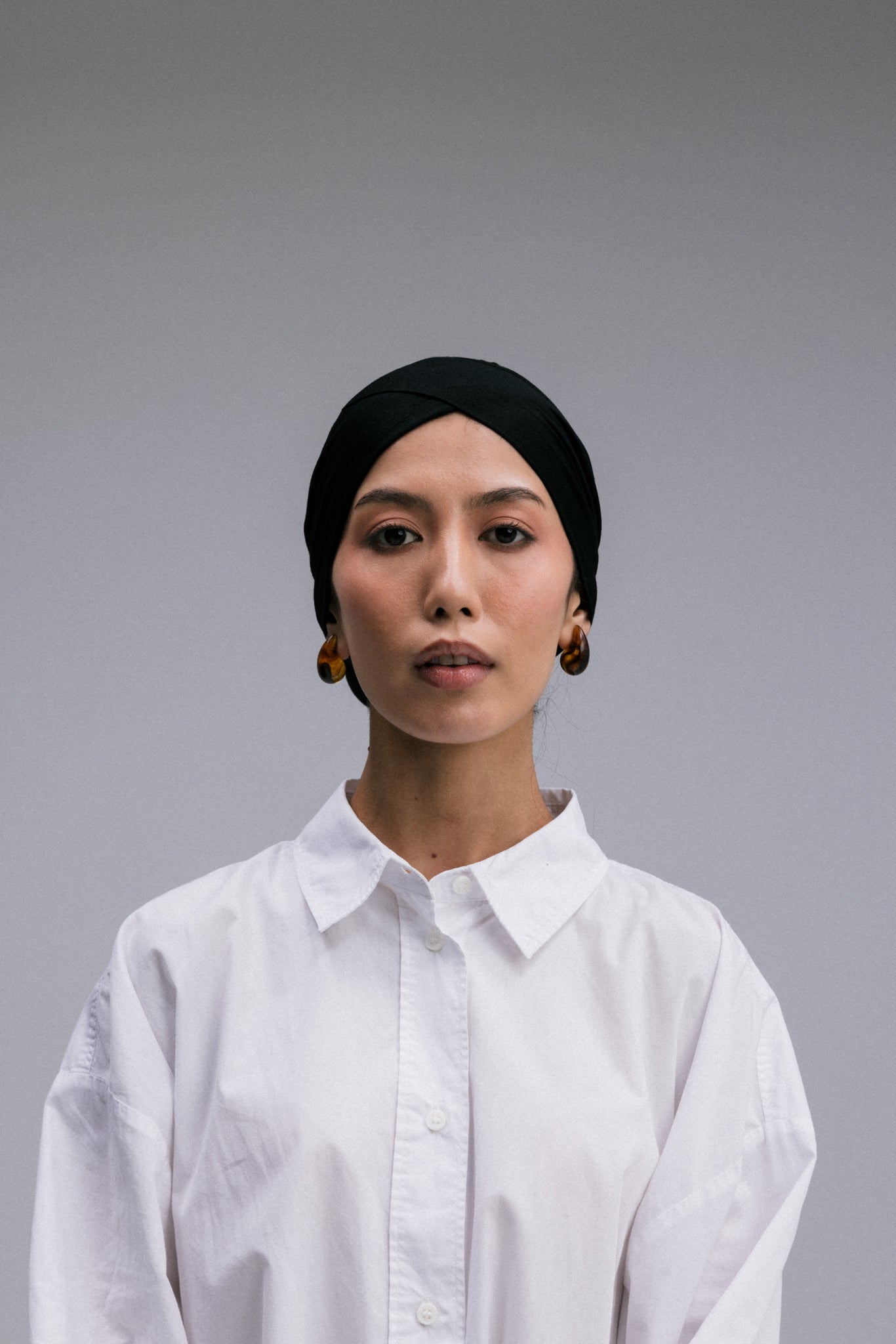 Overlay hijab undercaps, designed in a sleek V shape.