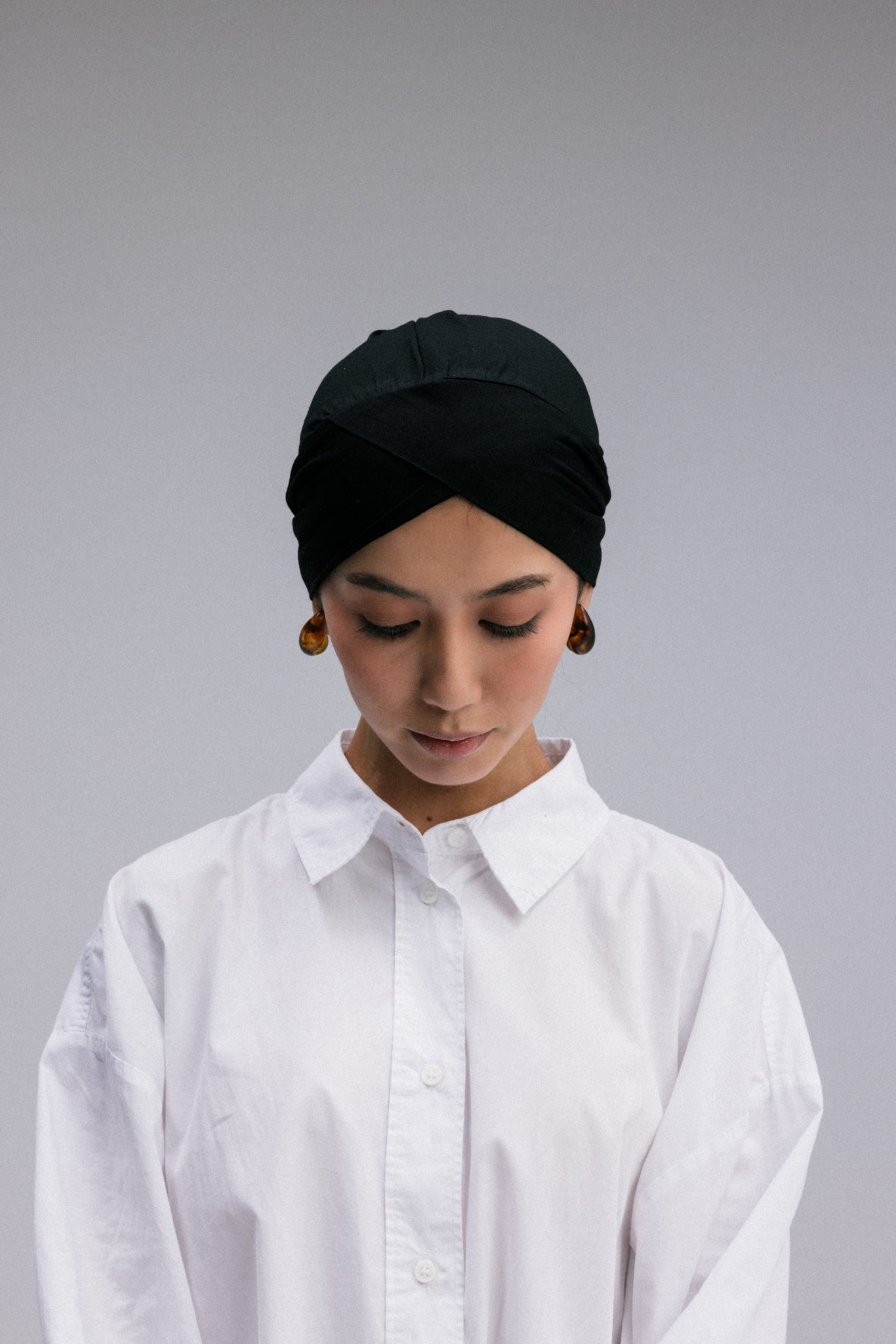 Overlay hijab undercaps, designed in a sleek V shape.