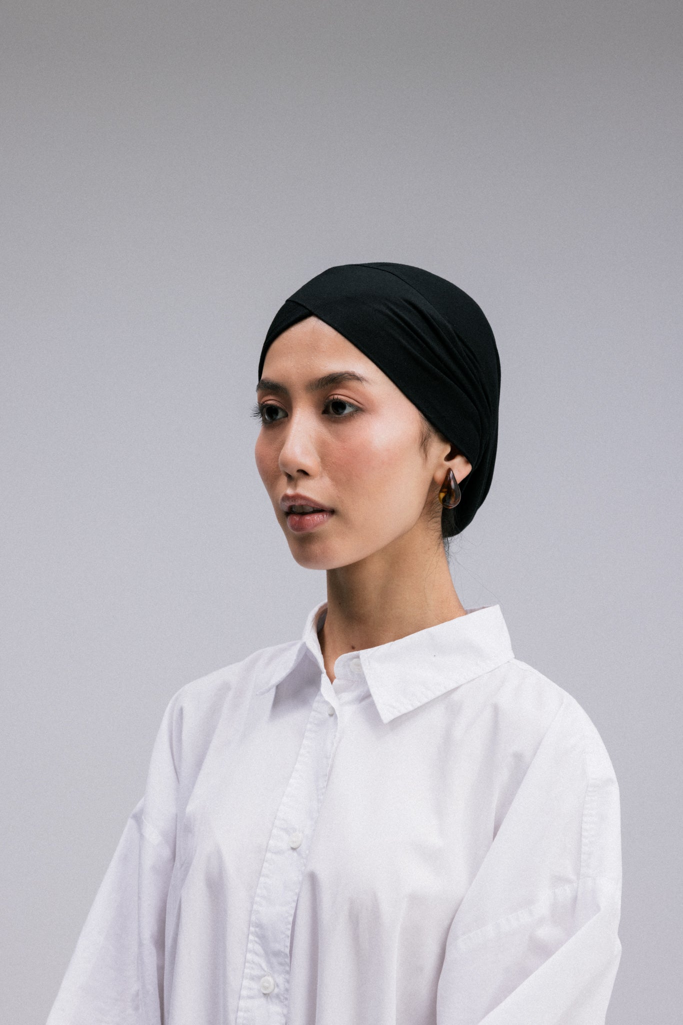 Overlay hijab undercaps, designed in a sleek V shape.