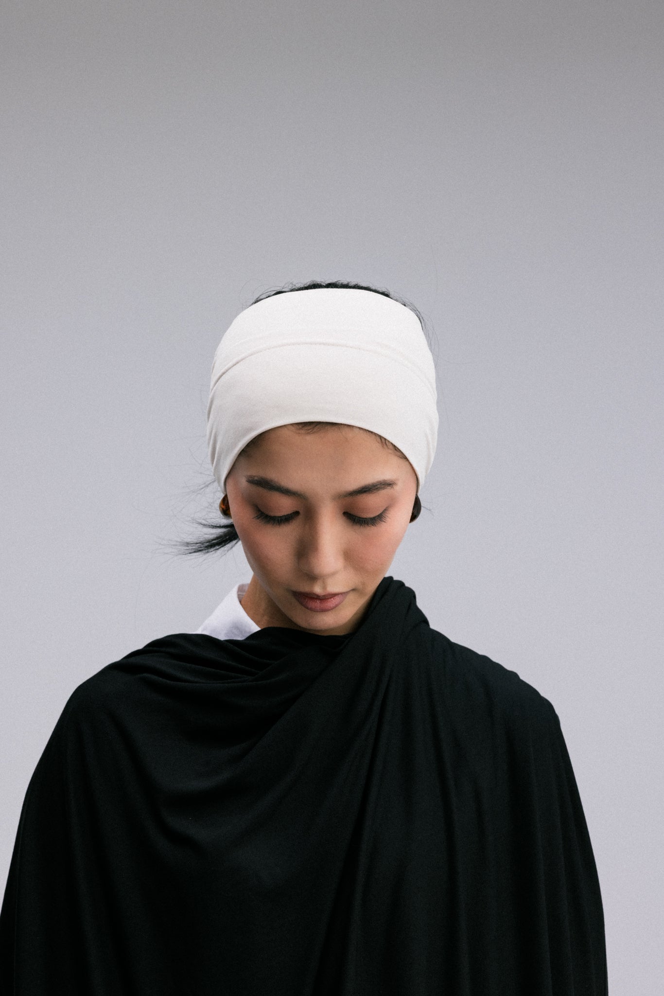 Overlay hijab undercaps in a headband design.