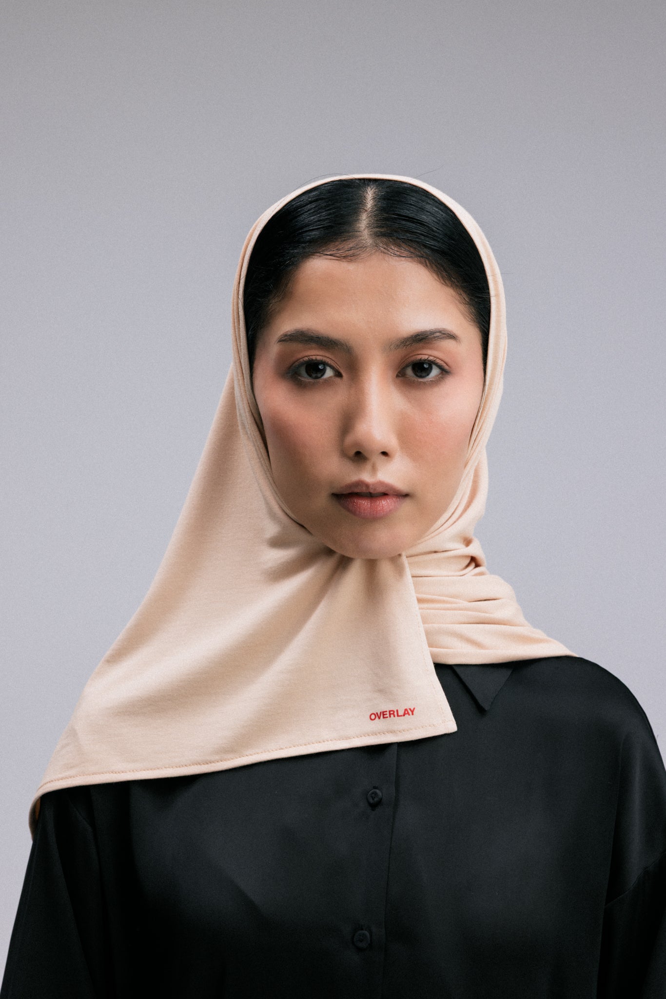 Experience the perfect blend of comfort and style with the Overlay jersey fabric headscarf.