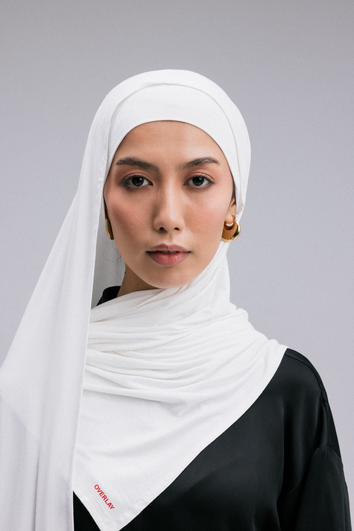 Experience the perfect blend of comfort and style with the Overlay jersey fabric headscarf.
