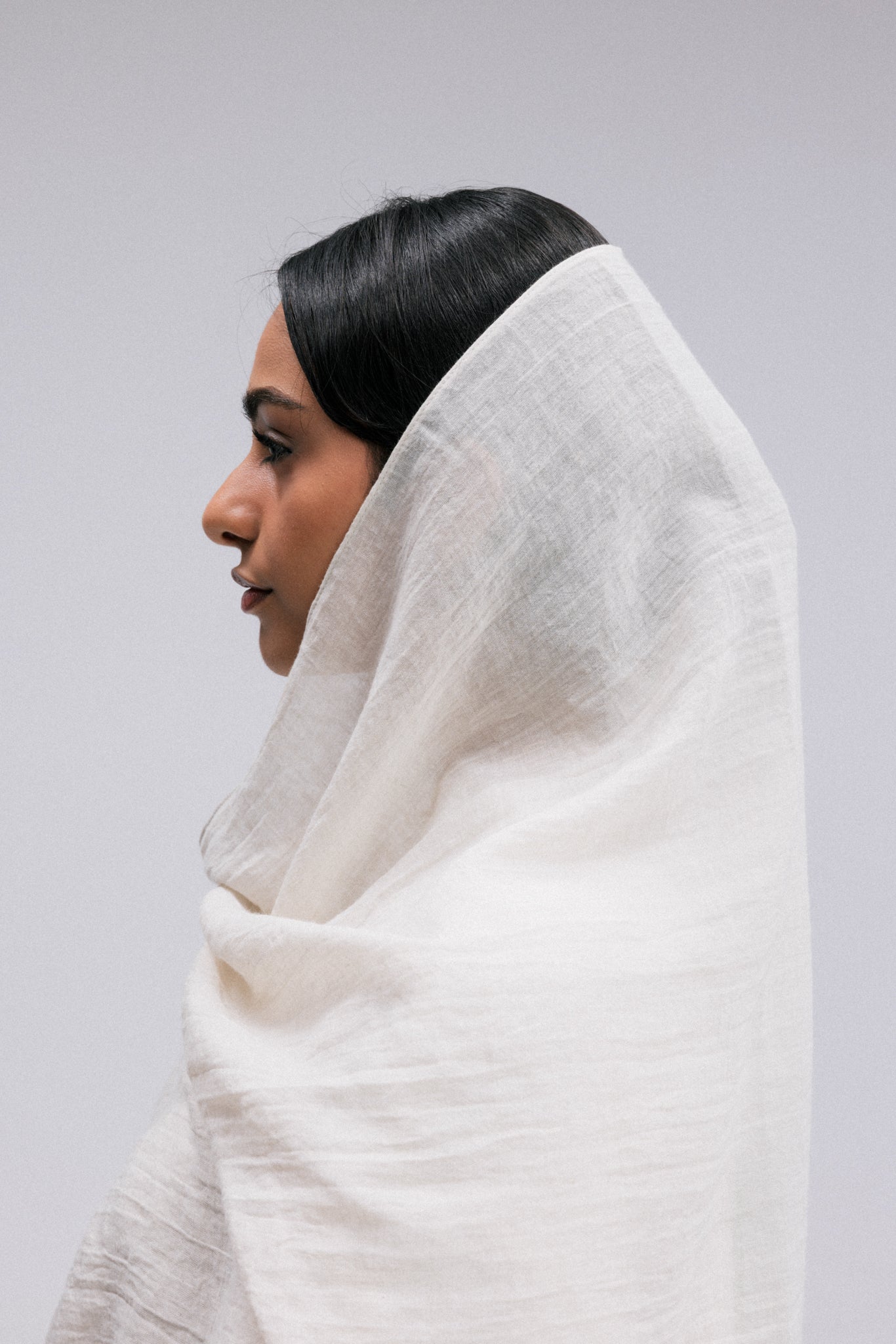 Overlay woven fabric hijab/headscarves combine elegance and comfort in a beautifully crafted accessory. Made from high-quality woven fabric,